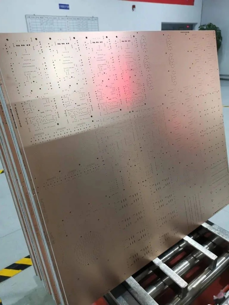 Figure 3-2. The copper-clad laminate boards that just came from the drilling process were covered in holes.